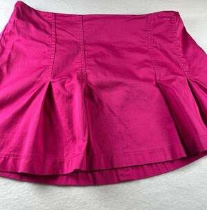 No Boundaries Juniors Stretch Pleated Mini Skirt in Racy Pink Y2K